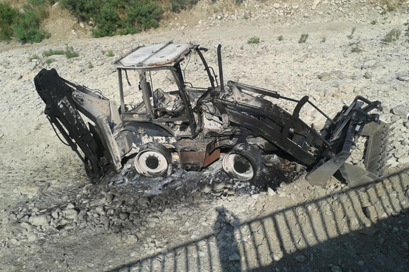 PKK’liler içinde Kur’an-ı Kerim bulunan iş makinesini yaktı